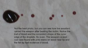 Blood droplets from weapon being carried